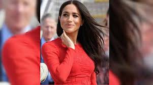 Meghan is wearing a giorgio armani belted silk dress featuring lotus flower embroidery, her pippa small 'colette' necklace and cartier gold love bracelet. Meghan Markle Creates History Becomes First Member Of British Royal Family To Vote In Us Election Lifestyle News The Indian Express