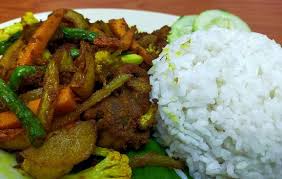 Nasi goreng authentic indonesian fried rice recipe 196 flavors. Nasi Putih Ayam Goreng Kunyit Picture Of Cahaya Maju Batu Caves Tripadvisor
