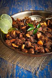 Erachi Ullarthiyadu Traditional Kerala Style Spiced Beef Roast With Coconut Via This Blog Life Scoops Spiced Beef Indian Food Recipes Kerala Food