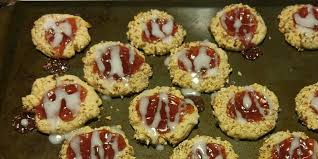 Roll 1 teaspoon dough into ball and dip into beaten egg white, roll in chopped nuts. Austrian Jam Cookies Recipe Allrecipes