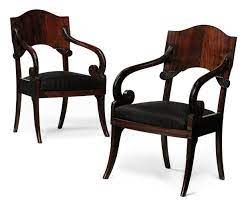 possibly russian early 19th century a pair of baltic mahogany open arm chairs armchair chair biedermeier furniture