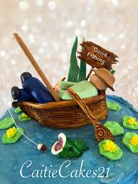 Add gum paste or marzipan pebbles with lightly twisted green fondant strips for the algae. Fondant Row Boat Caitie Cakes