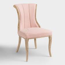 Boasting A Shapely Silhouette With Deep Vertical Channels In The Backrest Our Exclusive Soft Pink World Market Dining Chairs Pink Dining Chairs Dining Chairs