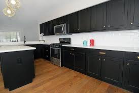 How To Make A Small Kitchen Look Good With Black Cabinets Black Kitchen Cabinets Small Kitchen Kitchen Design Small Dark Kitchen