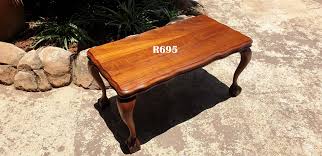 The ball and claw leg designs are richly ornate. Imbuia Ball And Claw Coffee Table 755x405x380 Junk Mail