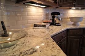 White Ice Granite And Creamy Backsplash Tile White Ice Granite Granite Countertops Kitchen Granite Countertops