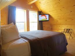 At cabins of mackinaw, guests enjoy an indoor pool, a fitness center, and a spa tub. Cabins Of Mackinaw Hotel Mackinaw City Usa Overview