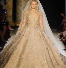 24 Most Expensive Wedding Dresses That Were Ever Worn Gold Wedding Gowns Gold Wedding Dress Elie Saab Bridal