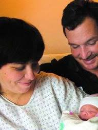 Alachua County's first baby of 2003 couldn't wait for trip to hospital