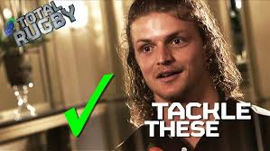 Listen to Nick Cummins singing Peter Andre's "Mysterious Girl" in Tackle  These