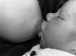 Image of Margaret Asante with new born children Daniella, Mellissa and  Felicity,