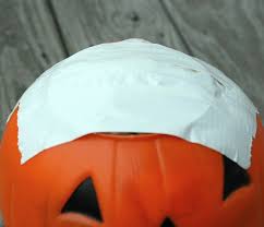 How to make the perfect paper mache pumpkin sculpture container or vase for fall. Plastic Pumpkin Bucket Makeover With Video Bread Booze Bacon