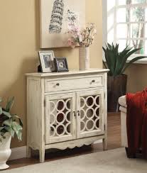 We also offer a number of different colors and finishes from wood and metal to mirrored glazes and metallic lacquers. Accent Cabinets Antiqued White Finish Accent Cabinet With Mirror Doors Quality Furniture At Affordable Prices In Philadelphia Main Line Pa