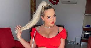 Porn star Lana Wolf goes topless in train for Scotland fans ahead ...