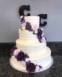 Four Tier White Wedding Cake With Pink And Purple Fresh Flowers Purple Wedding Cake Wedding Cakes Wedding Cake Flavors