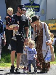 'full of adventures!' elsa pataky shares adorable photo of her and chris hemsworth's twin sons sasha and tristan holding hands. Chris Hemsworth Carries Twin Sons Tristan And Sacha On Family Day Out Daily Mail Online