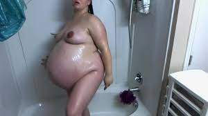 Heavily pregnant woman in shower | xHamster