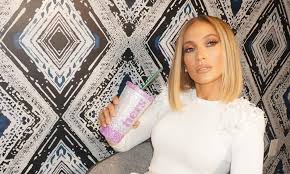 Jennifer lopez, above, bared her famous curves in a custom atelier versace illusion gown. Jennifer Lopez Celebrates Every Major Life Event With Bling Cups