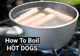 Once water is boiling, use tongs to immerse the hot dogs in the water. How To Boil The Perfect Hot Dog On The Stove Kitchensanity