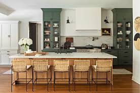 For a modern twist on this classic style, choose a gloss finish , metallic handles and glossy worktops, such as granite, to create a sophisticated kitchen. Gray Green Shaker Cabinets In A Kitchen Remodel Town Country Living