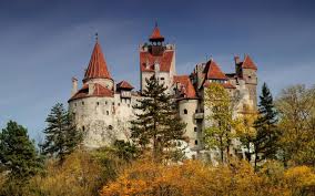 Outside of bran castle sits a dark stone cross with runic writing. The Origins Of Dracula S Castle Behind The Myth