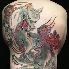 Kitsune Tattoos Origins Meanings Types Of Japanese Fox Tattoos Tatring Tattoos Pierci In 2020 Japanese Tattoo Women Japanese Tattoo Designs Grey Ink Tattoos
