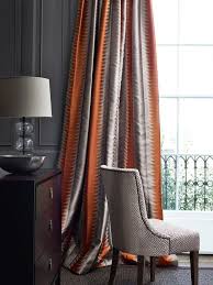 Orange And Grey Striped Curtains In A Fabric By Cowtan Tout Jane Churchill Living Room Orange Burnt Orange Living Room Decor Burnt Orange Living Room