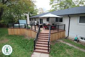 This Deck Is Build Using Trunorth Decking And Complimented With Cedar Skirt And Aluminum Rail A Beautiful Hot Tub Finishes Deck Aluminum Railing Outdoor Decor