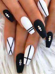 Long Nails Black Coffin Nails Short Coffin Nails Long Nails These designs include different shades like pink, white, black, blue, glitter, 3d, etc.