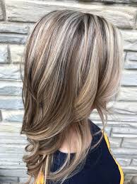 Toned down this beautiful head of hair with some dark blonde foils.just enough to make it look two toned. Light Brown Hair With Blonde Highlights And Lowlights Brown Hair With Blonde Highlights Hair Styles Brown Blonde Hair