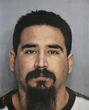 GANG SQUAD: Raymond Campos is wanted for attempted murder of a police  officer.