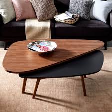 They owe this to the natural properties of the wood which is a warm and elegant its top seems to be a large wood slice, hence the small gap towards the center and the live edge. Large Contemporary Natural Wood Wedge Coffee Table 67 X 17 67 X 38 X 17 Overstock 32114590