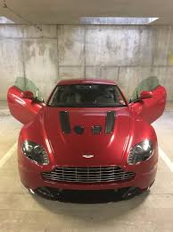 Image result for Magma Red 2011 Aston Martin