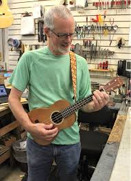 One really quick an easy way to get a strap on the guitar is to just use a shoelace or a piece of string. How To Install A Ukulele Strap Ukulele