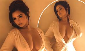 Demi Rose puts on a VERY busty display in a sheer white plunging dress |  Daily Mail Online