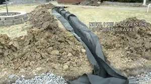 Diy How To Build A French Drain How To Drain Surface Water In Your Yard Or Property French Drain Backyard Drainage Landscape Drainage