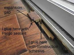 Crown molding can either bond with the ceiling or allow for space above the cabinet. Laminate Transitions At Sliding Doors Installing Laminate Flooring Flooring Transition Diy Flooring