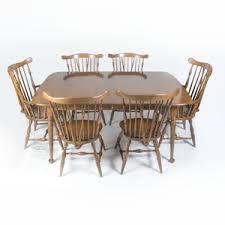 Picture your family and friends gathered around the farmhouse dining table…the aroma of a stew simmering in the kitchen…the warmth of a crackling fire in the fireplace. Lot Art Early American Style Maple Table And Six Chairs By Heywood Wakefield