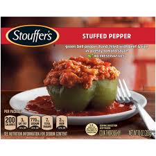 A standard stuffed peppers recipe is made with bell peppers (yellow, green, orange, or red) filled with a stuffing composed of ground beef, tomatoes, cooked rice, cheese, herbs, and spices. Stuffed Pepper Frozen Meal Official Stouffer S