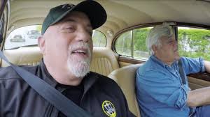 Jay Leno and Billy Joel take a 1962 Jaguar Mark II for a spin