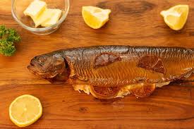 Top Down View Of Smoked Trout With Lemons And Butter And Some White Trout Meat Ready To Be Eaten Bge Biggreen Smoked Trout Recipe Smoked Trout Trout Recipes