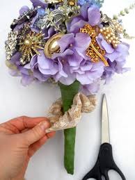 Therefore, wrap wire around a piece of ribbon to form a loop. How To Make A Brooch Bridal Bouquet How Tos Diy