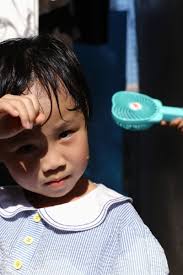 No air conditioning, nowhere to go: residents in HK's poorest  neighbourhoods struggle to keep cool during record long May heatwave