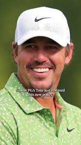 Yesterday at Medinah: Justin Timberlake and Bill Murray hug something out.