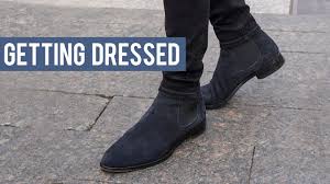 With puffer jacket, cap and black jeans. Wearing Black And Navy Chelsea Boots With Denim Jeans Getting Dressed Step By Step 23 Youtube