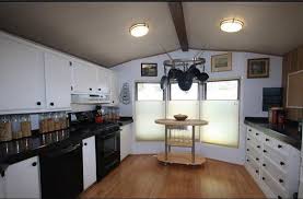 New windows, roof, siding, and an addition are just some of the updates on this double wide manufactured home remodel. 6 Great Mobile Home Kitchen Makeovers Mobile Home Living