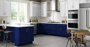 To add character to a neutral palette, consider going with a striking blue kitchen backsplash. Navy Is The New Black All The Perks Of Navy Cabinets