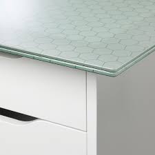 Making a custom work space is easy with our wide range of table tops in solid wood, tempered glass and other finishes. Glasholm Alex Table Glass Honeycomb Pattern White 58 1 4x28 3 4 Ikea
