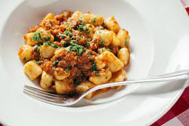 Reduce the heat to medium and continue. Il Porcellino S Gnocchi Bolognese Lettuce Entertain You