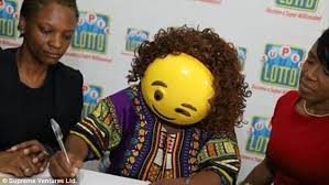 Learn more about our lotto winners and how lotterywest grants support the wa community. Jamaican Lottery Winner N Gray Collects Check Wearing Smiley Face Emoji Mask Express Digest